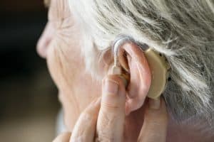 elderly woman wearing a hearing aid 2021 08 27 00 05 45 utc