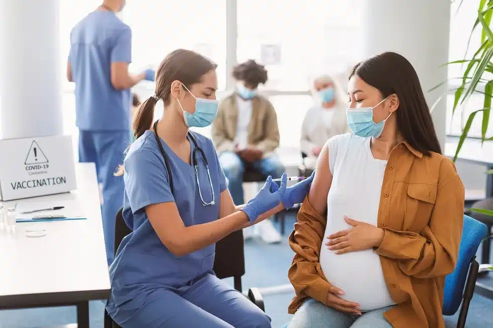 pregnant asian lady receiving vaccine injection in 2022 01 19 00 11 55 utc