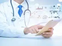 close-up-doctor-is-showing-medical-analytics-data-medical-technology-concept