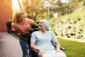 woman with cancer walks street with her daughter 1